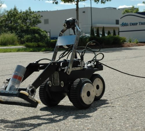 robot aspirateur cuve milieu confiné